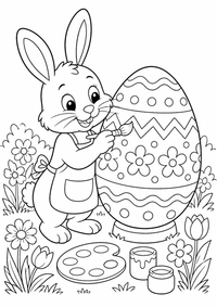 Easter bunny painting an egg es un dibujo para colorear A4 gratuito para imprimir con contornos negros claros y una escena atractiva para niños.